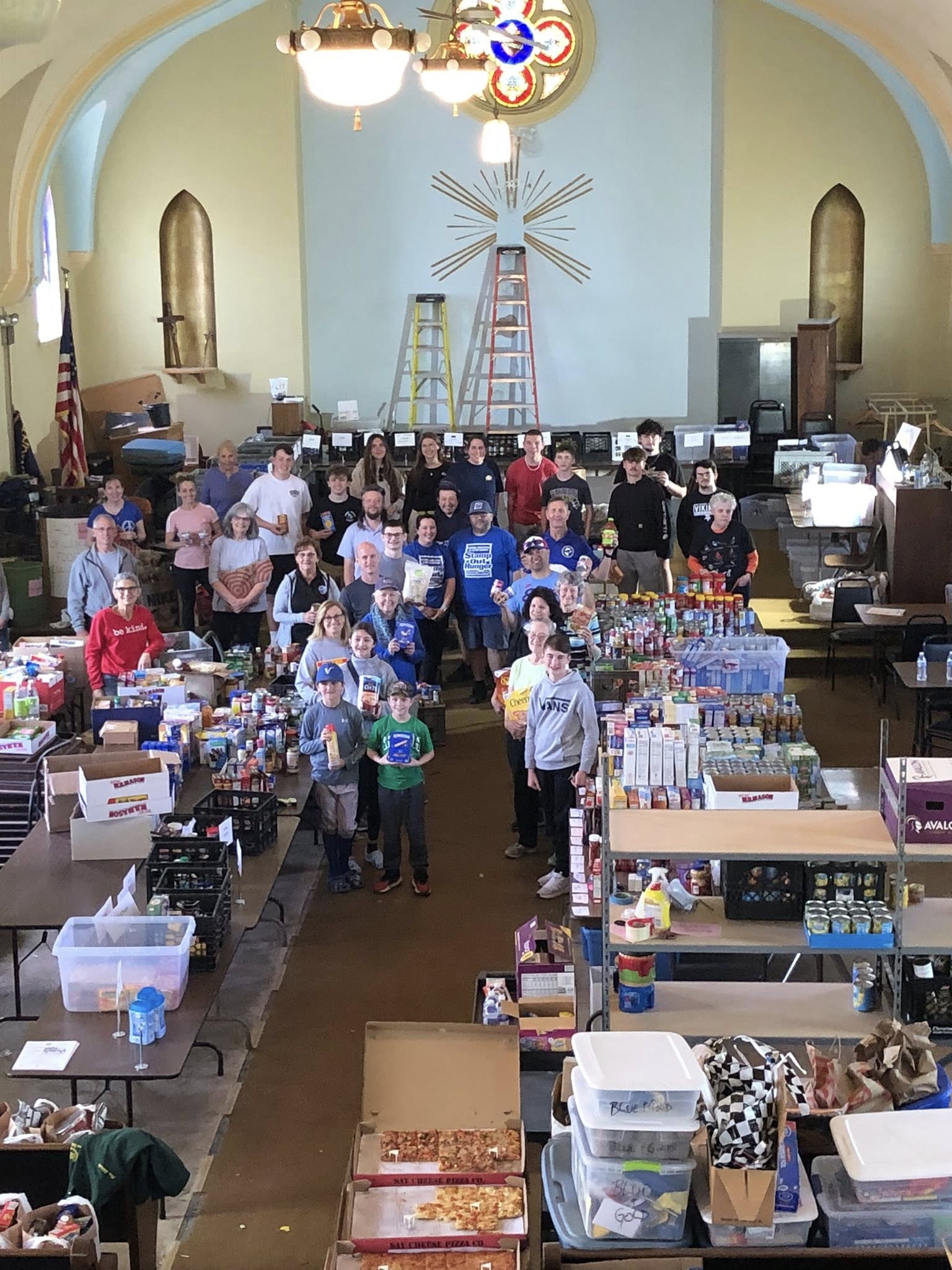 Volunteers working at a Neighbors Foundation food distribution at St. Stephen's Church